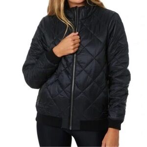 Patagonia Women's Black Quilted jacket.